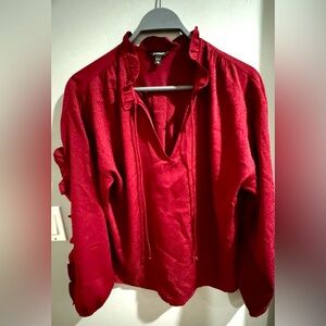 Beautiful wine color ruffle detail blouse- perfect for holiday season